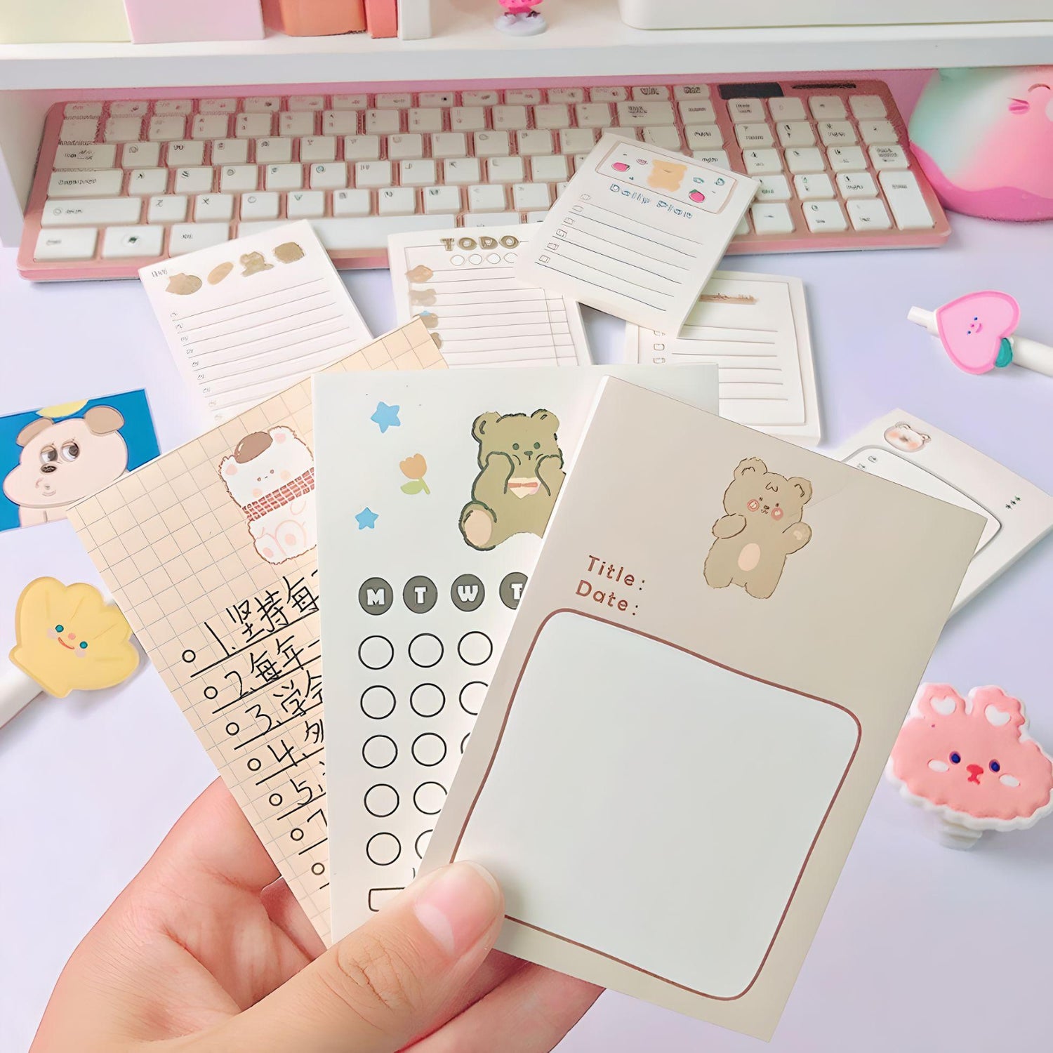 someone holding different styles of Kawaii Bear Sticky Notes