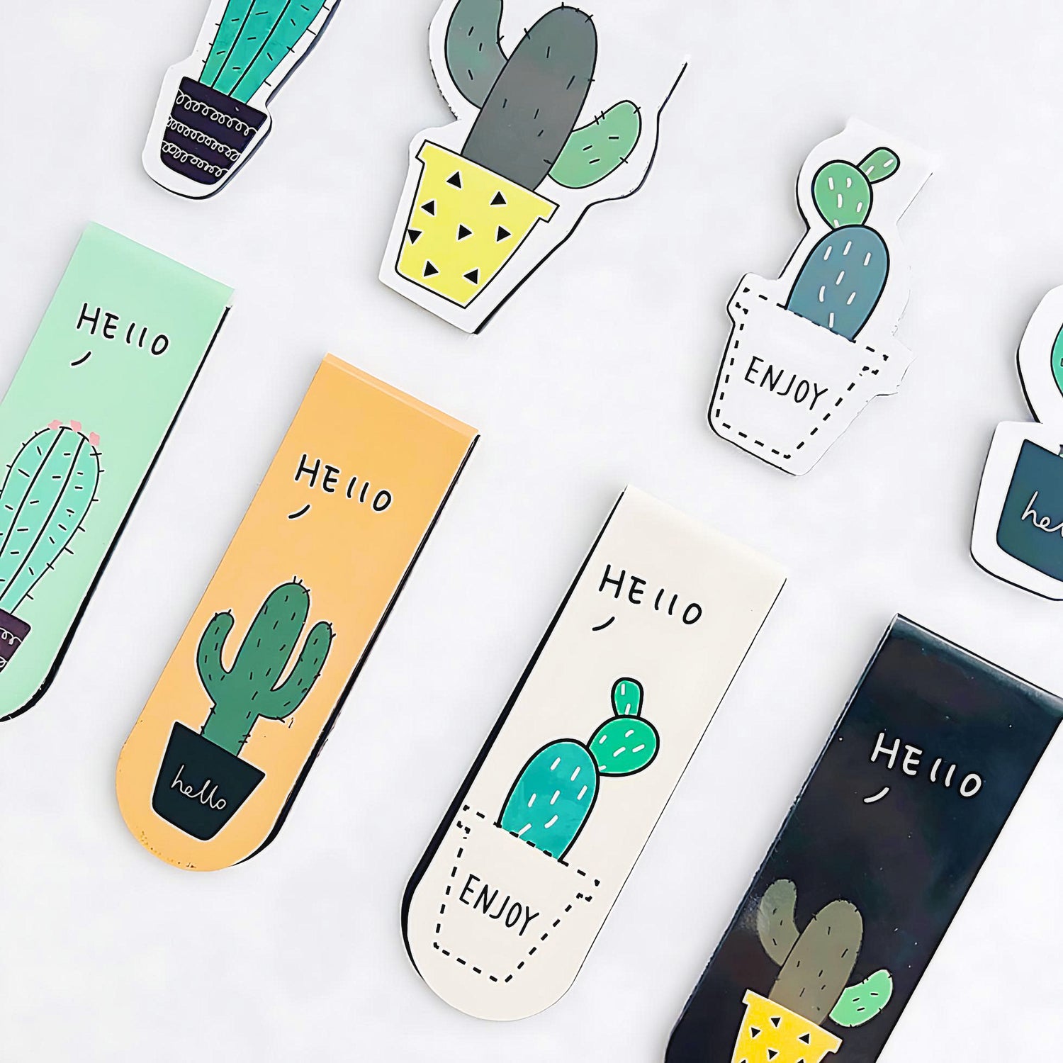 four different sets of cactus magnetic bookmark on a white background