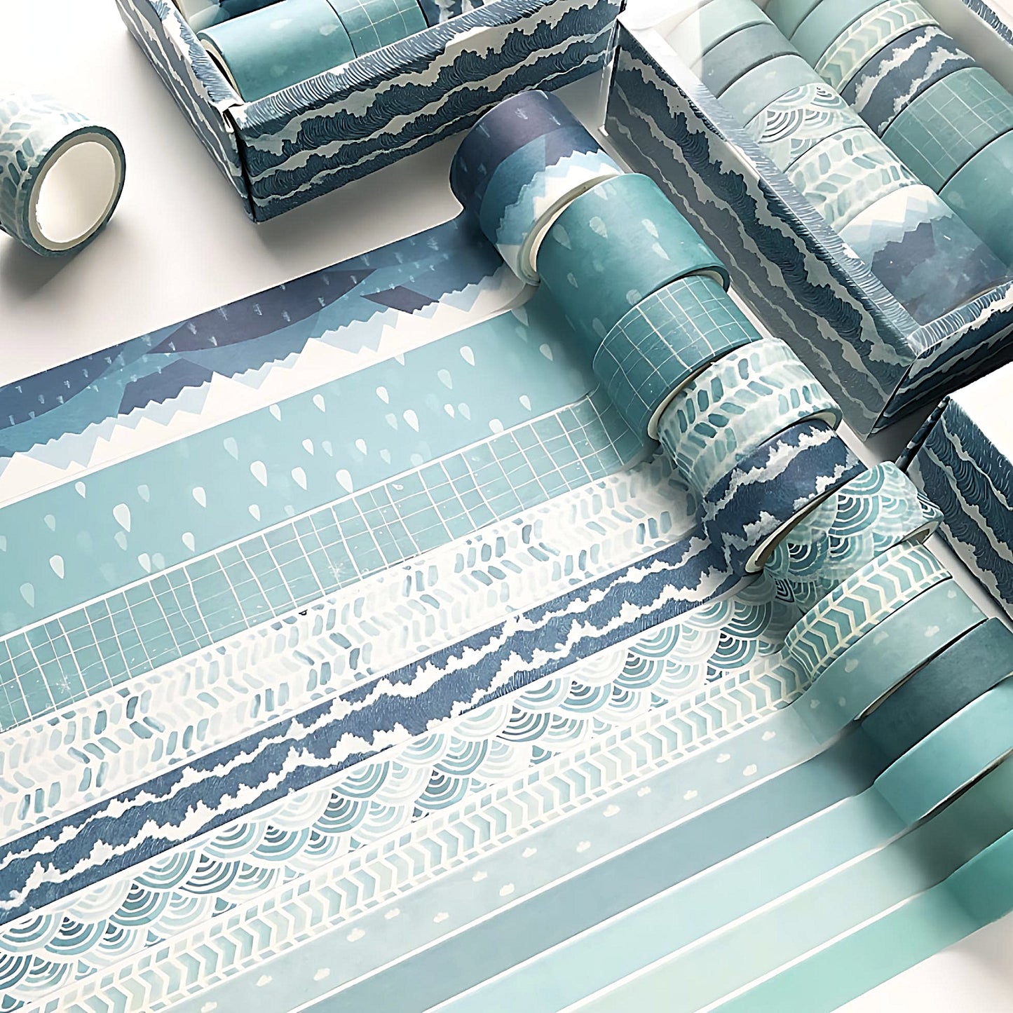 a colorful washi tape set in blue colors on a white table