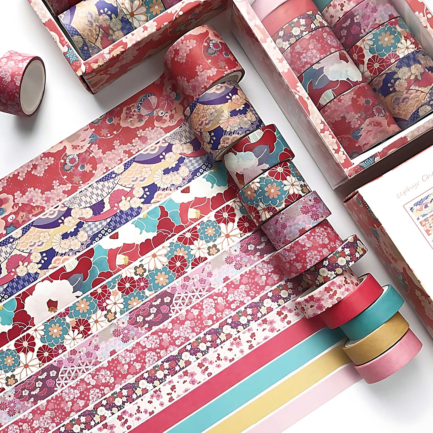 a colorful washi tape set in red colors on a white table