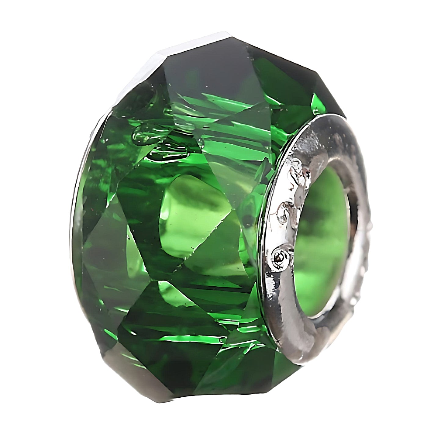 a faceted glass bead in green color