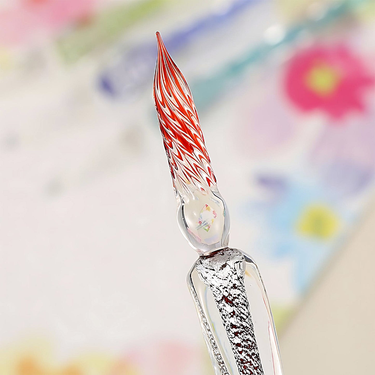 a close-up of a glass dip pen
