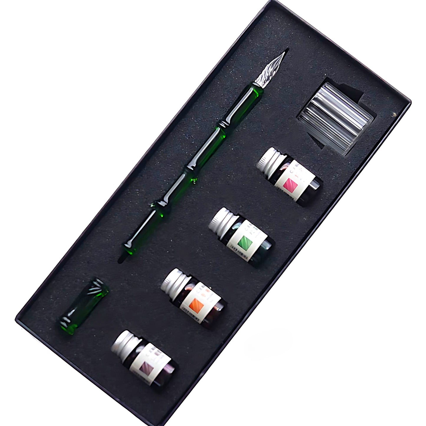 a glass dip pen green set with four bottles of ink in a box