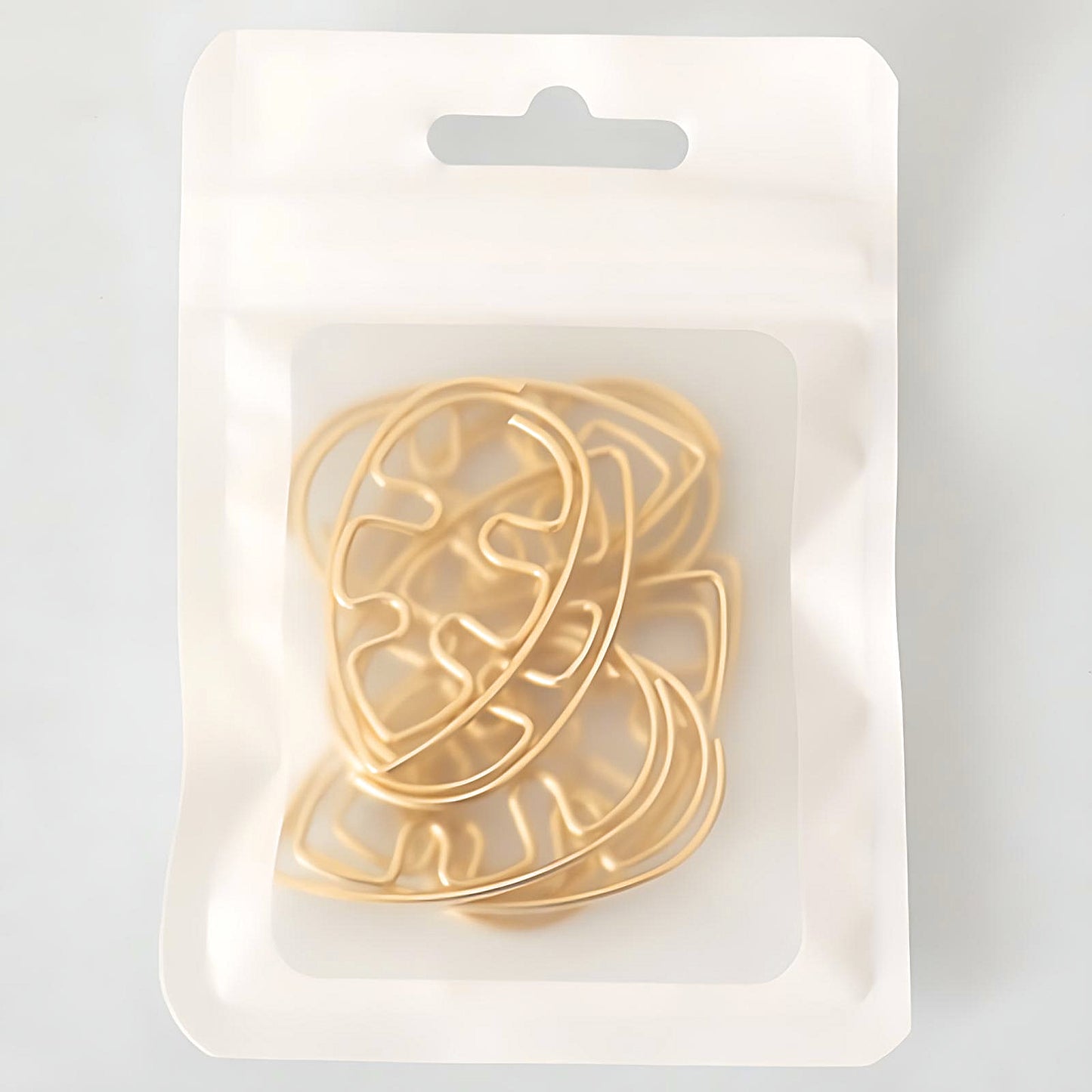 a pack of gold paper clips 