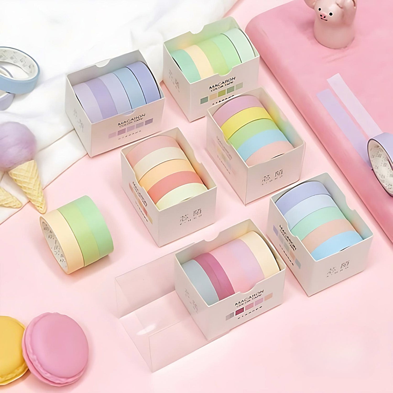 different set of Macaron washi tapes on a pink background