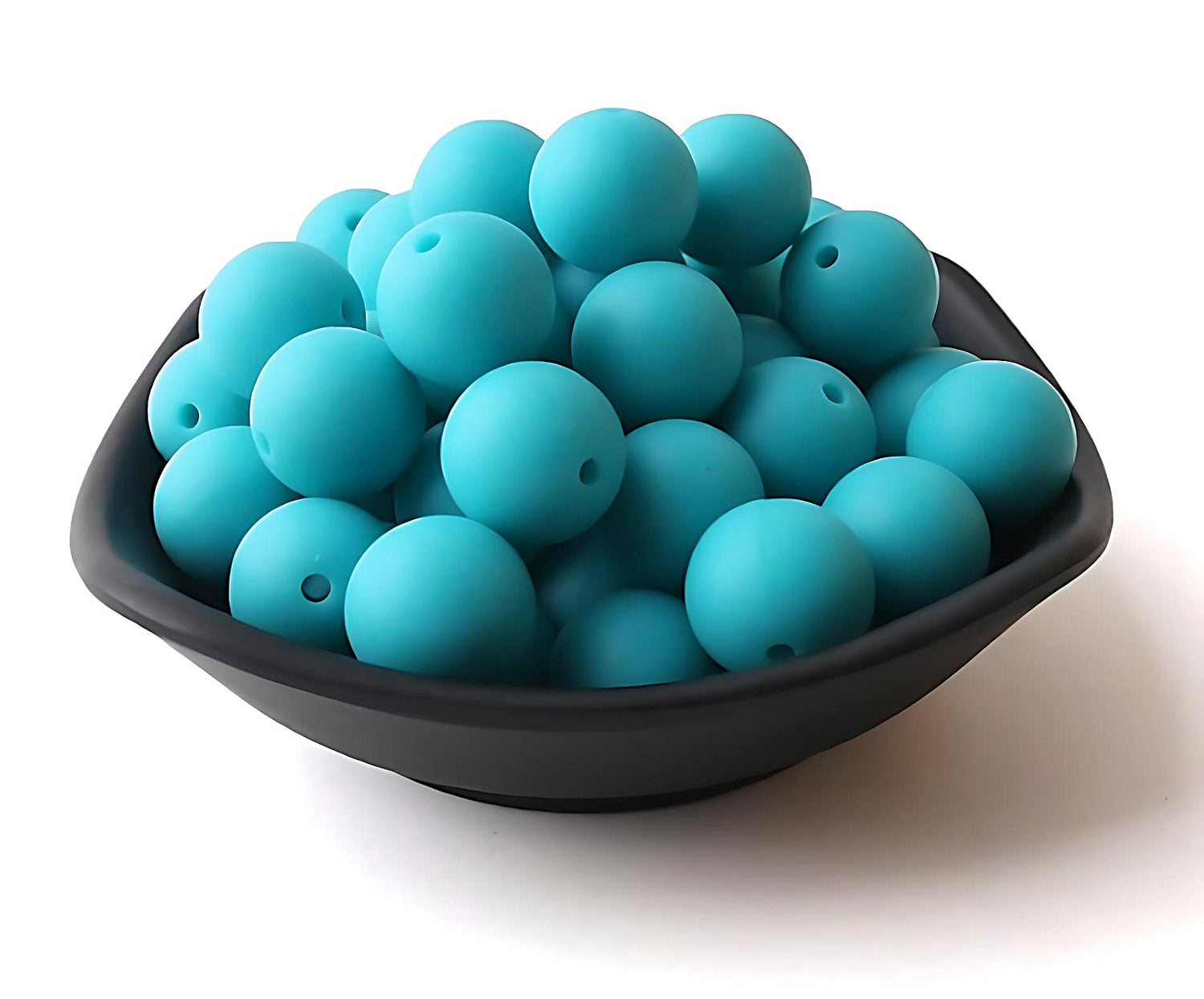 turquoise silicone beads in a black bowl