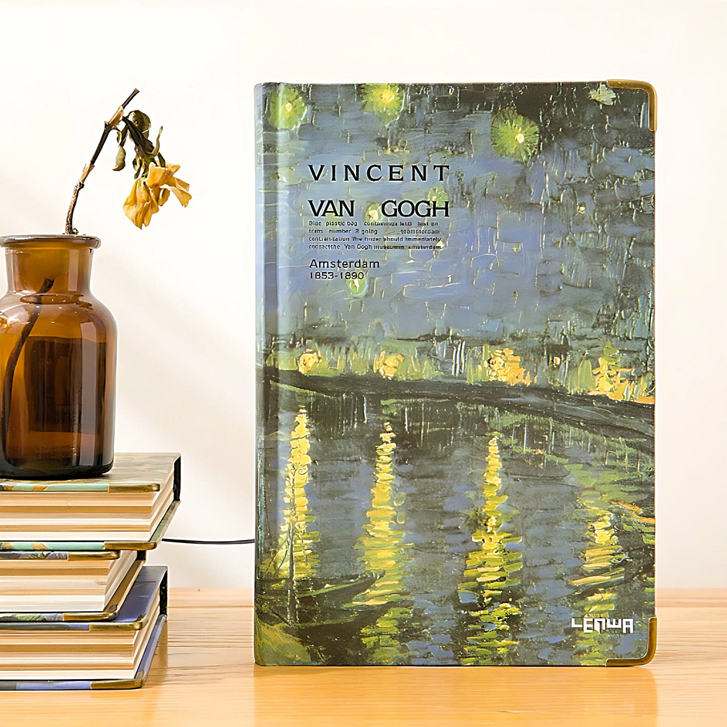 a notebook with a Van Gogh painting on the cover