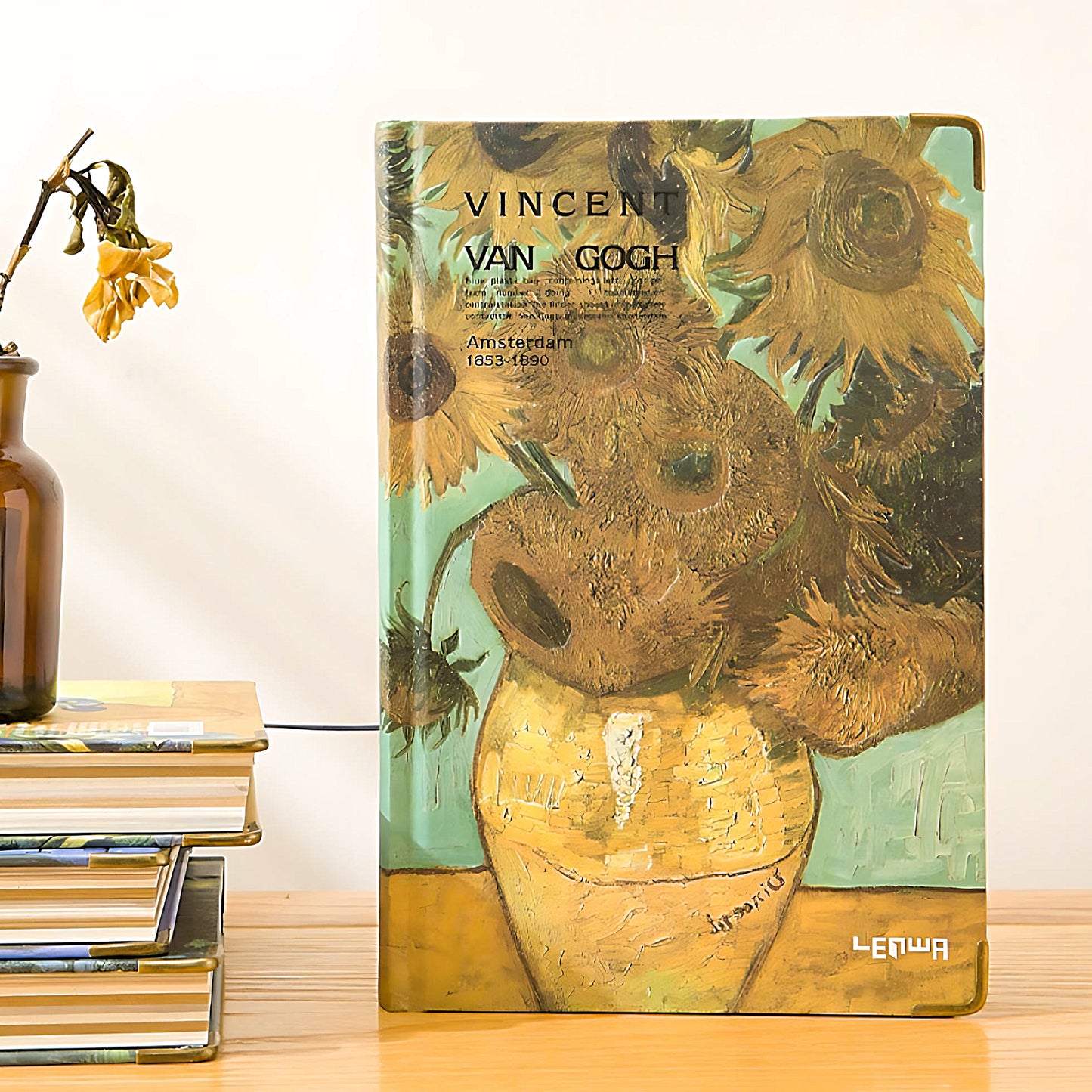 a notebook with a Van Gogh painting on the cover