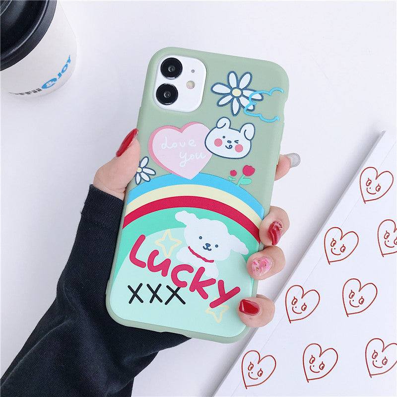 a woman holding an iPhone case with a Kawaii dog design on it